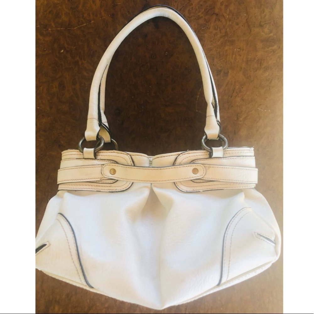 White soft leather handbag with black stitching